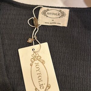 Joyfolie washed black color Henley snap up short sleeve blouse. new with tags.